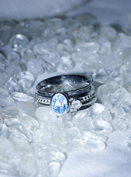 Silver Spinner Ring with Blue and White Topaz